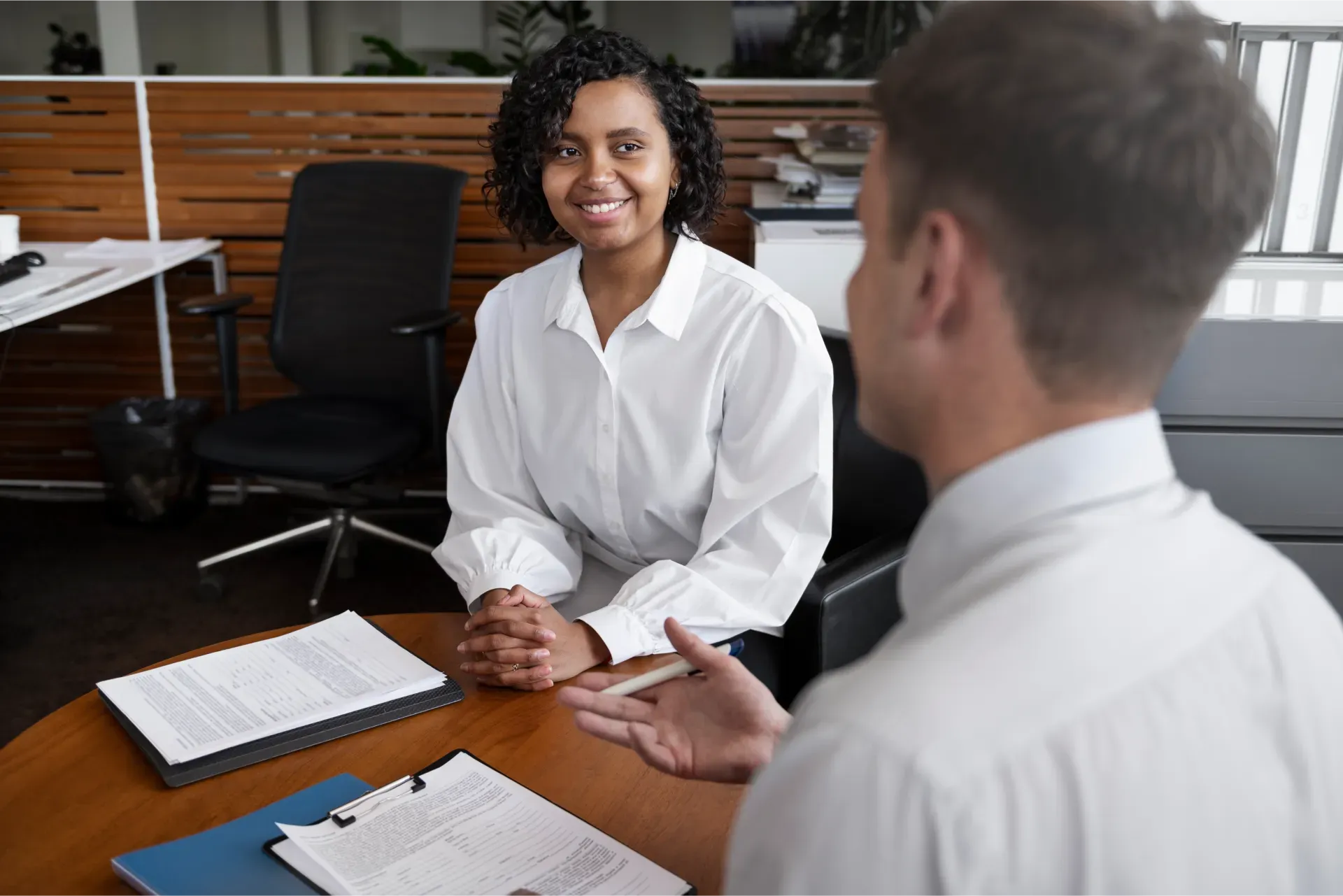 woman_enjoying_her_financially_independence_while_buying_car.webp